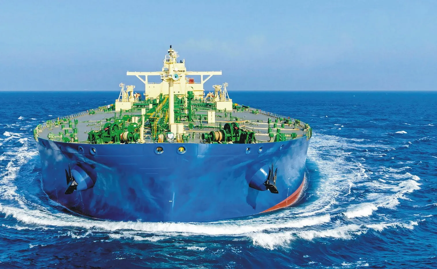 Blue-hulled tanker underway at sea